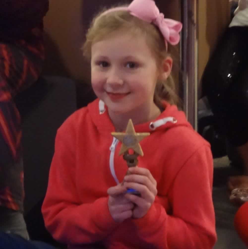 Louise shows off her Award