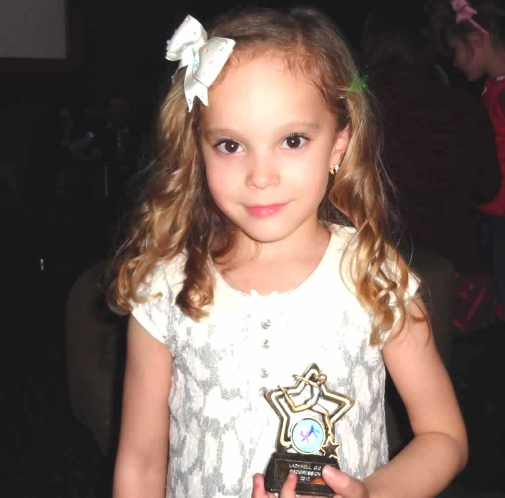 Maddie with her Award