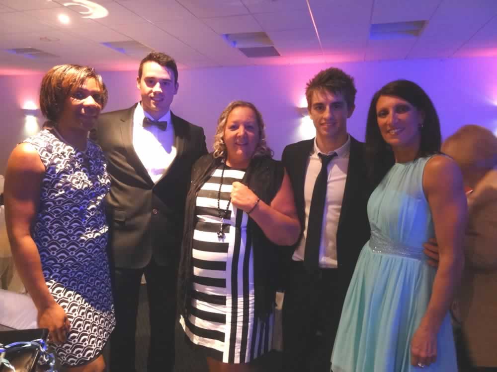 Ladywell Coaches stand beside Olympic Gymnasts