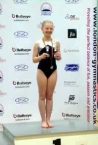 Megan with her clean sweep of trophies.