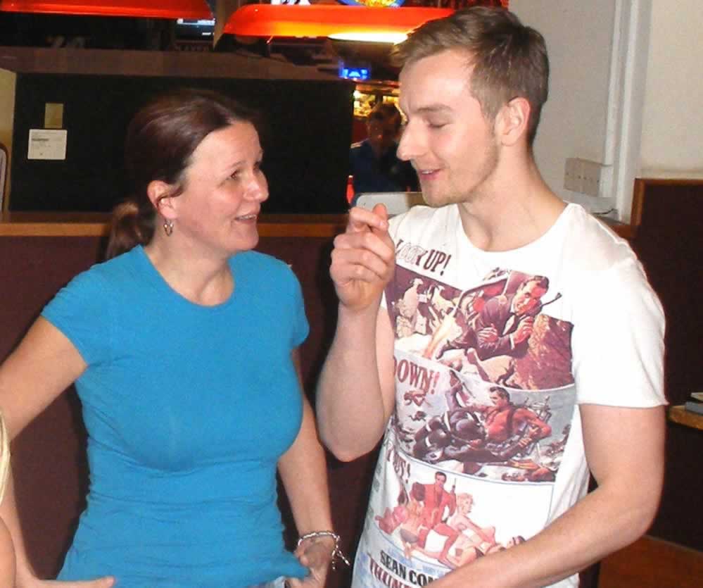 Calum gets ready to sing the team's praises to Sharon