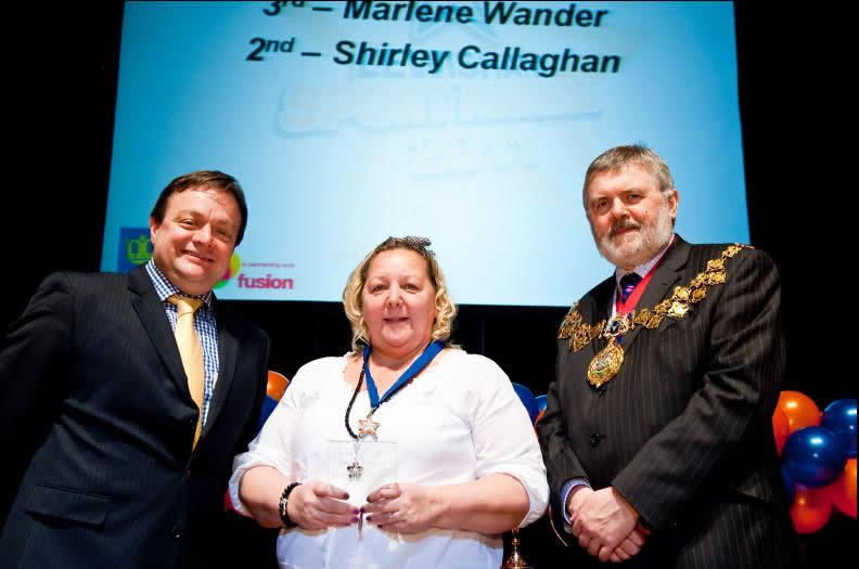 Shirley receiving her second place award in the Coach of the Year category.