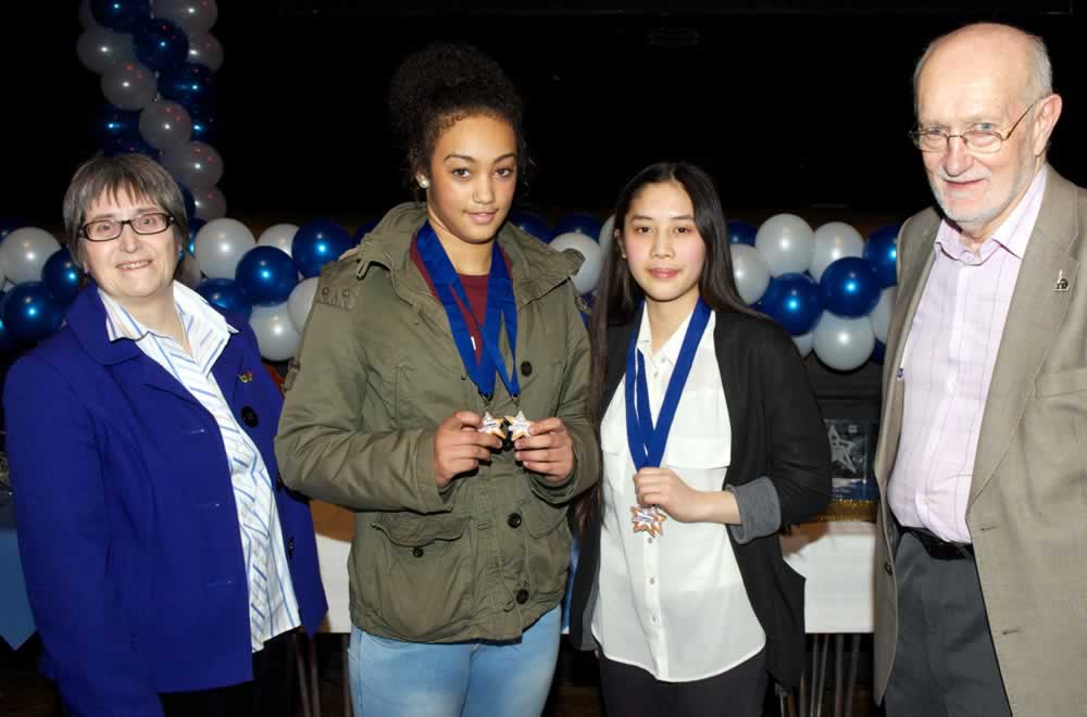 Maisie and Quynh with their Gold Medal Awards