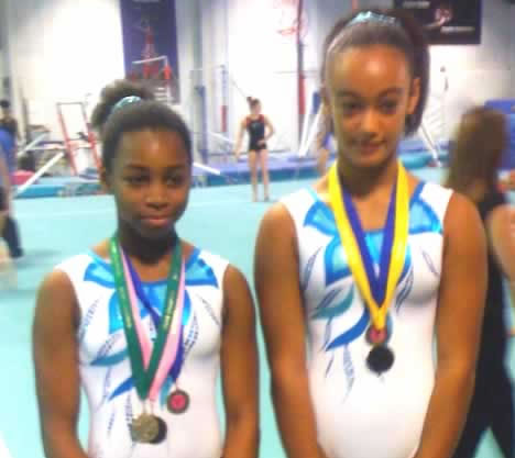 Celeste and Maisie with medals
